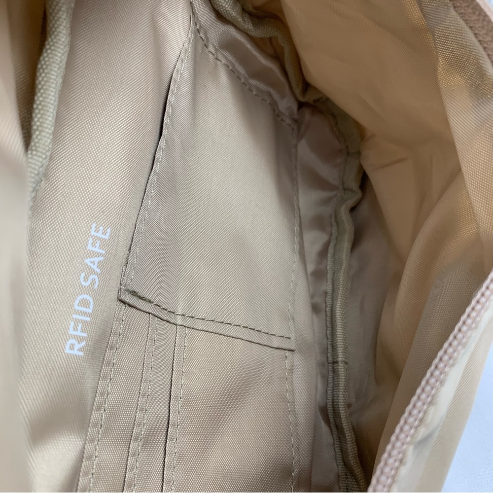 NWOT The Foldie Crossbody Travel Bag Taupe Beige RFID Safe Cut-Proof Strap - Picture 9 of 11